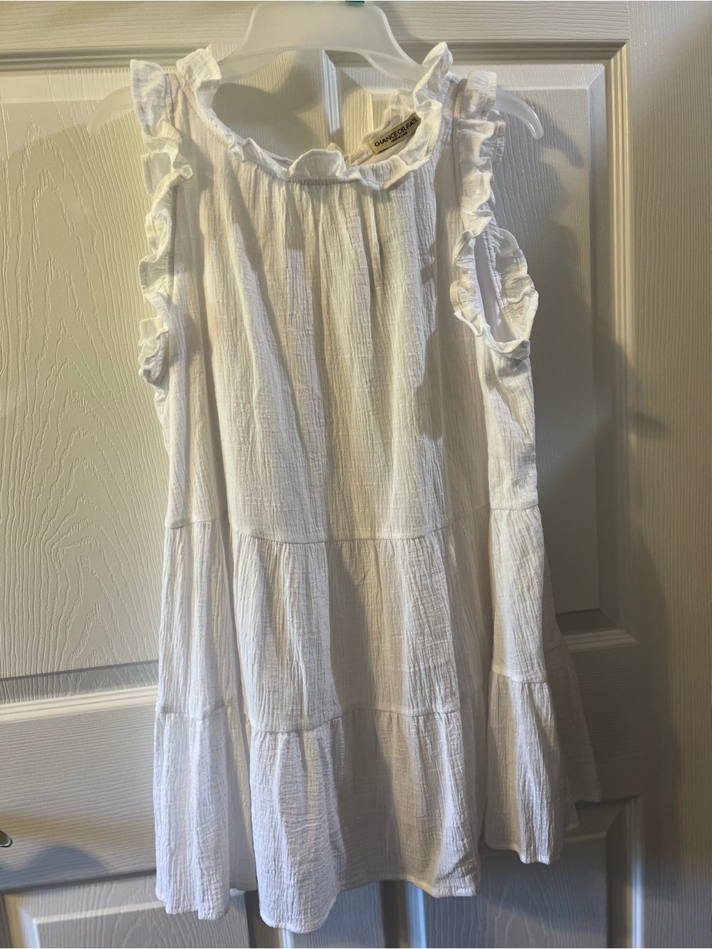 Chance or Fate White Ruffled Sleeveless Blouse Baby Doll Silhouette